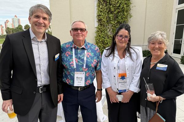 Mark Bischoff, President and CEO of Starnet Flooring with Berry Herrlinger, Jocelyn Fetzer and Pam Herrlinger