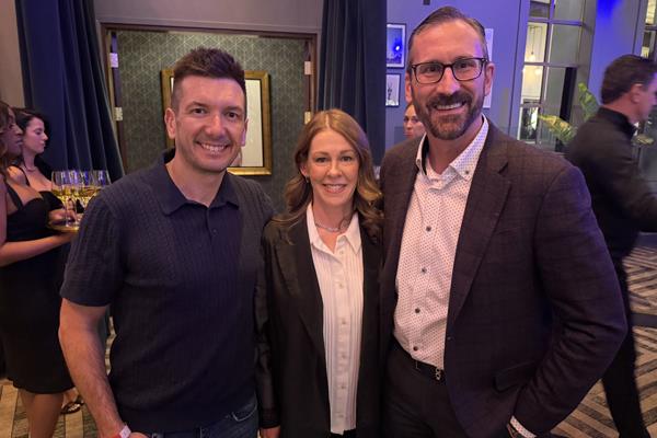 Drew Barber (Floor and Home Spokane) with Jennifer and Jason Randolph (Mohawk Industries)