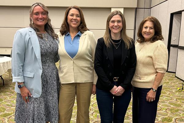Renee Tester Littleton of Kahrs and WIFI board member; Julie Russell of Gemini Industies; Ashley Do Carmo of Brown Oaks Flooring; and Brenda Cashion of UCX