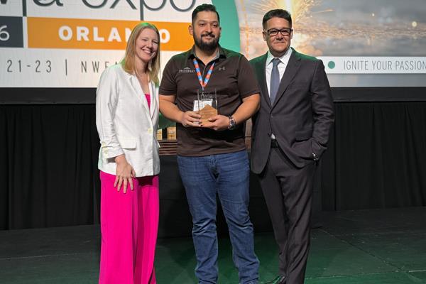Oliver Barajas, Bridgebay Flooring receiving the 2026 Emerging Leader Award