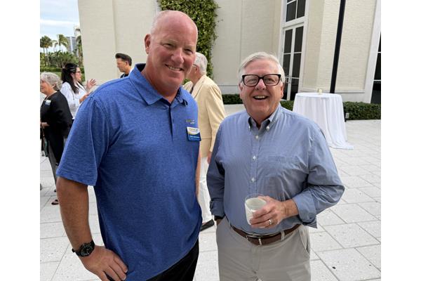 Starnet's Eric Boender with Mike Gallman of Mohawk Industries