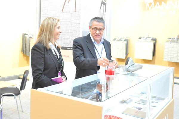 Alex Jaurequi at Mannington Commercial demonstrates Kool-Aid tests