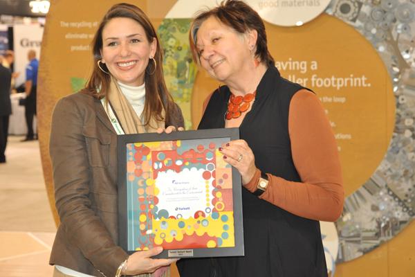 Diane Martel (Tarkett/Johnsonite) presents Restart Award to FKP Architects