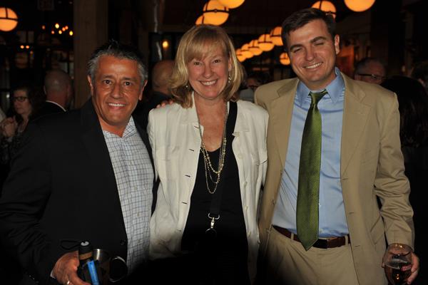 Alex Jauregui and Zack Zehner of Mannington with Anne Harr from Floor Focus