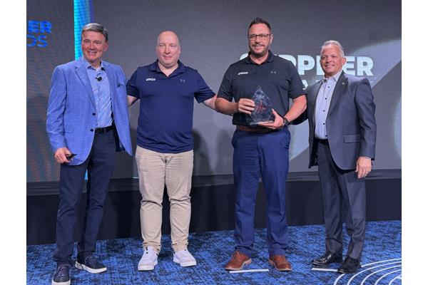 Marco Ludwig and Brian Preuss accept the Uzin Utz award for Best Support