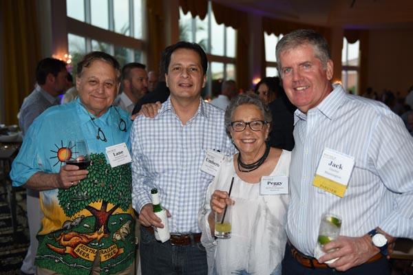 Lane Brettschneider and Umerto Aponte (Lane's Floor Covering), Peggy Weis (RD Weis) and Jack Ganley (Mannington)