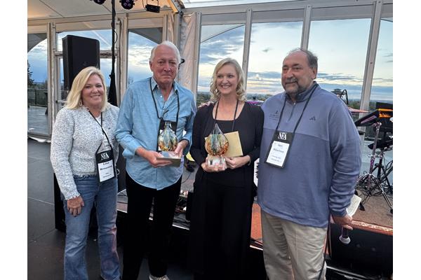 The NFA's Lisa Browning and Ian Newton honoring retired member Bill Waters and retiring member, Ann McDermott