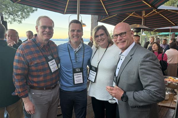 Jason and Natalie McSwain with McSwain Carpet and Floors, Shaw Industries Benjamin Liebert and Nebraska Furniture's Tony Boldt