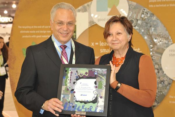Diane Martel (Tarkett/Johnsonite) presents Restart Award to Continental Commercial Floors
