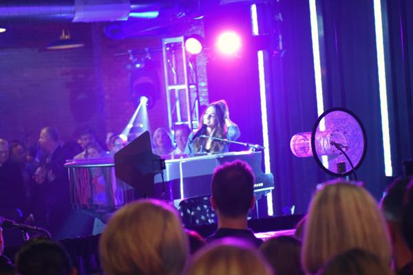 Sara Bereilles performing at The Mohawk Group party.