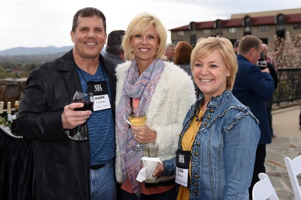 Mark and Penny Carnino (Grigsby's) and Lisa Macco (Macco's Floor Covering)